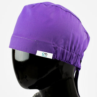 Hochwertige medizinische Kopfbedeckung aus nachhaltigem Stoff mit praktischem Gummizug und Schwitzschutzeinsatz für maximalen Komfort bei der Arbeit.
